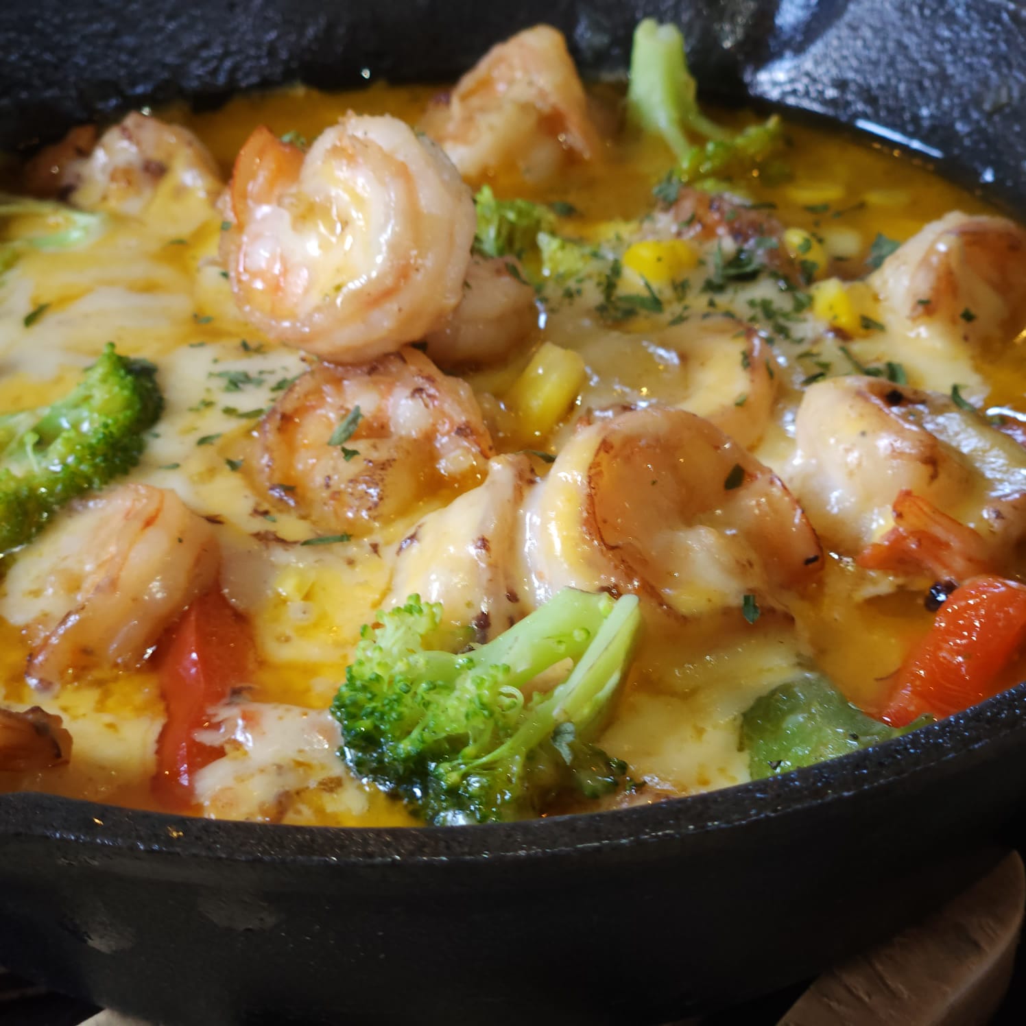 Camarones gratinados.